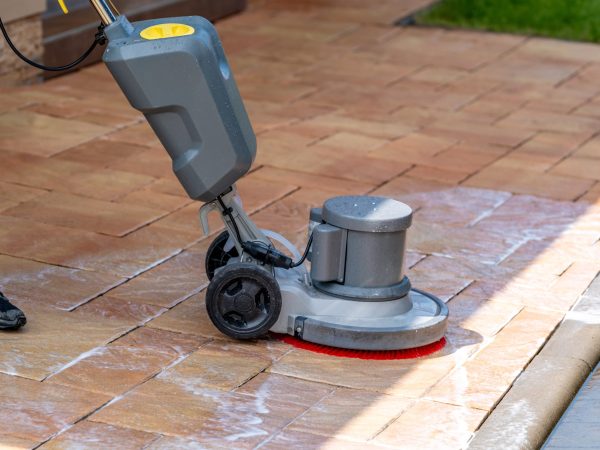 Chemical,Machine,Cleaning,Concrete,Pavement,In,Front,Of,The,House